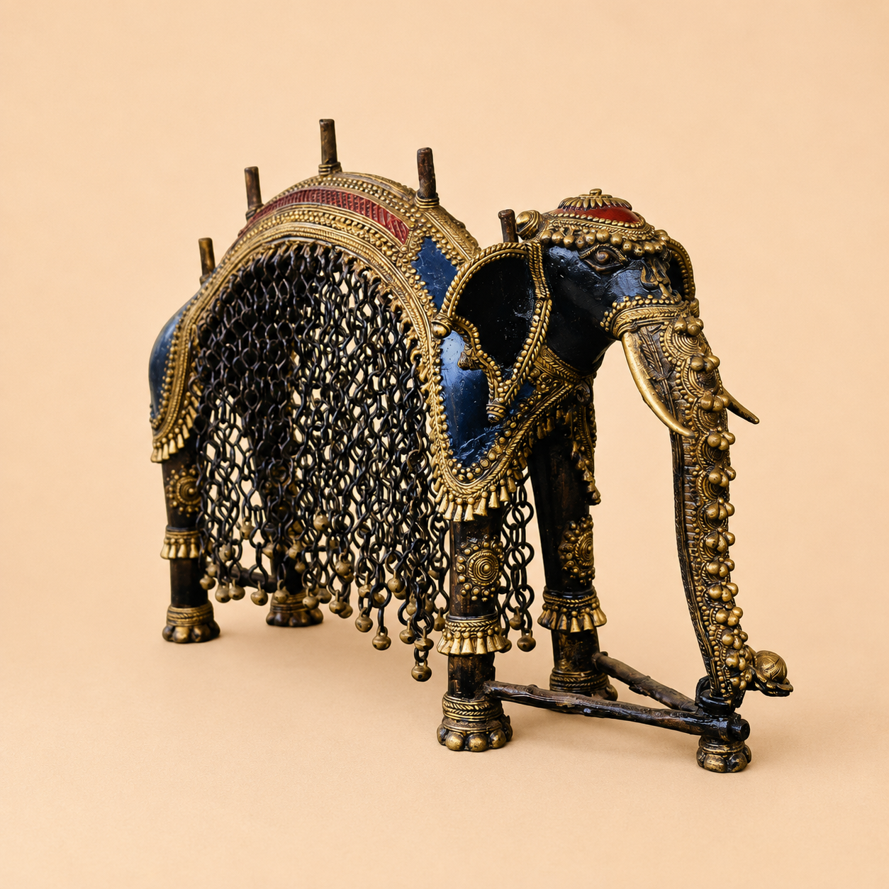Antique brass elephant figurine with intricate details