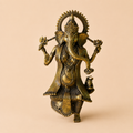 Brass Ganesha statue in studio setting