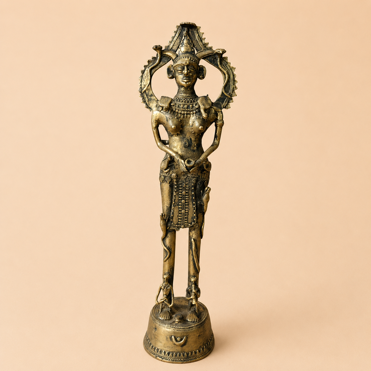 Ornate tribal deity statue in bronze