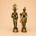 Tribal brass figurines in warm light